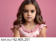 Serious funny little girl in pink dress arms crossed at pink backdrop, posing serious looking. Lovely kid lady coquette expressing emotion, studio shot. Child image emotion concept. Copy ad text space. Стоковое AI-изображение, AI-художник Aleksandr Golubev / Фотобанк Лори