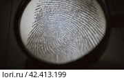 Dactyloscopic investigate fingerprints. Macro shot. Стоковое видео, видеограф EStarodubov / Фотобанк Лори