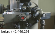 Tape drive mechanism of 35mm cine-film in movie projector. Film strip on vintage projector. Стоковое видео, видеограф EStarodubov / Фотобанк Лори