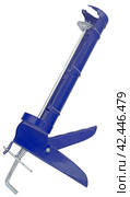 Ручной монтажный пистолет для клея на белом фоне. Silicone glue gun, isolated on white background. Стоковое фото, фотограф Татьяна Д / Фотобанк Лори