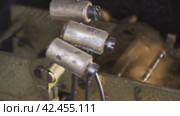 Hammers strikes with audio. Internal clock mechanism. Ringing bells 5 o'clock. Impact watch hammers driven by clockwork. Macro shot. Стоковое видео, видеограф EStarodubov / Фотобанк Лори