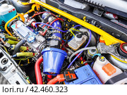 Tuned car engine with a variety of devices and improvements. Стоковое фото, фотограф FotograFF / Фотобанк Лори