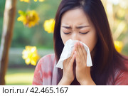 Woman tissue blowing. Generate Ai. Стоковое AI-изображение, AI-художник Иван Рябоконь / Фотобанк Лори