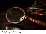 Magnifying glass wooden desk. Generate Ai. Стоковое AI-изображение, AI-художник Иван Рябоконь / Фотобанк Лори