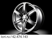 Titanium car wheel. Generate Ai. Стоковое AI-изображение, AI-художник Иван Рябоконь / Фотобанк Лори