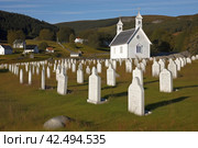 Memorial cemetery with church in Norway. Generate ai. Стоковое AI-изображение, AI-художник Иван Рябоконь / Фотобанк Лори