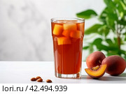 Glass of refreshing tamarind drink and fresh fruits glass. Generate Ai. Стоковое AI-изображение, AI-художник Иван Рябоконь / Фотобанк Лори