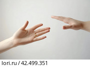 Handing human hands on white background. Generate ai. Стоковое AI-изображение, AI-художник Иван Рябоконь / Фотобанк Лори