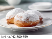 Sufganiyot powdered sugar. Generate Ai. Стоковое AI-изображение, AI-художник Иван Рябоконь / Фотобанк Лори