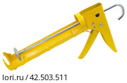 Ручной монтажный пистолет для клея на белом фоне. Silicone glue gun, isolated on white background. Стоковое фото, фотограф Татьяна Д / Фотобанк Лори