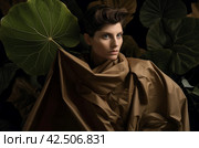 Person hiding by giant green leaves. Generate Ai. Стоковое AI-изображение, AI-художник Иван Рябоконь / Фотобанк Лори