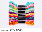 Many skeins of mouline thread for embroidery melange background. Стоковое фото, фотограф Татьяна Терехина / Фотобанк Лори