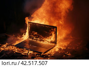 Overheated Burning laptop table. Generate Ai. Стоковое AI-изображение, AI-художник Иван Рябоконь / Фотобанк Лори