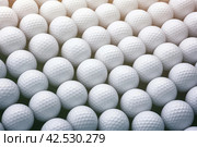 Dimpled Golf ball. Generate Ai. Стоковое AI-изображение, AI-художник Иван Рябоконь / Фотобанк Лори