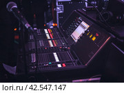Audio sound DJ mixer control panel remote for music and vocals. Professional mixing equalizer console in radio studio. Recording mixing desk with selective focus. Стоковое фото, фотограф Константин Григорьев / Фотобанк Лори