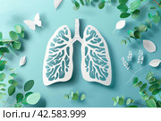 A human lung on a blue background surrounded by foliage. International Asthma Day. Стоковое AI-изображение, AI-художник Ярославский Максим / Фотобанк Лори