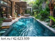 Pool in the shade of trees near the house, tropics,    Generative AI. Стоковое AI-изображение, AI-художник Анна Кривицкая / Фотобанк Лори