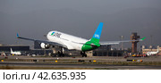 LEVEL Airbus approaching to runway at El Prat Airport in Barcelona (2020 год). Редакционное фото, фотограф Яков Филимонов / Фотобанк Лори