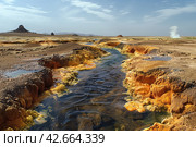Hydrothermal flow in a volcanic area in the desert. Стоковое AI-изображение, AI-художник Евгений Харитонов / Фотобанк Лори