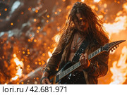 Rockstar in leather jacket playing heavy metal guitar with fire background. Стоковое AI-изображение, AI-художник Юрий Поздников / Фотобанк Лори