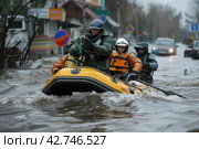 Rescuers on a boat in a flooded area, emergency situation, Стоковое AI-изображение, AI-художник Анна Кривицкая / Фотобанк Лори