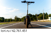 electric scooter on the scooter path. Стоковое фото, фотограф Igor Skripachev / Фотобанк Лори