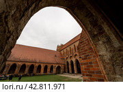 CHORIN, GERMANY - APRIL 01, 2024: Ruin of Chorin Abbey. Chorin Abbey (Kloster Chorin) is a former Cistercian abbey. An example of Gothic architecture. Founded in 1258. It was secularized in 1542. Редакционное фото, фотограф Sergey Kohl / Фотобанк Лори