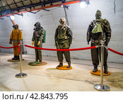 Манекены в гидрокостюмах различных моделей, военно-исторический музей фортификационных сооружений, город Балаклава, Крым (2023 год). Редакционное фото, фотограф Вячеслав Палес / Фотобанк Лори