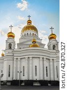 Saransk, Russia - June 5, 2023. Cathedral of St. Theodore Ushakov in Saransk, Russia. It is named after the Russian saint and admiral Fyodor Ushakov. The inscription above the entrance of the Cathedral of the Holy Righteous Warrior Theodore Ushakov. Редакционное фото, фотограф Оксана Медведева / Фотобанк Лори