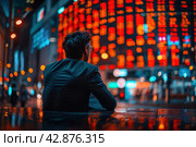 A man in a business suit looks thoughtfully at the busy streets of the city with bright neon lighting. This image is full of atmosphere and can be interpreted as a moment of reflection on life's journey or as a break from the fast pace of modern life. Стоковое AI-изображение, AI-художник Анна Кривицкая / Фотобанк Лори