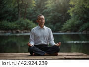 The leader meditates after a working day. Recuperation after work. Стоковое AI-изображение, AI-художник Александр Поташев / Фотобанк Лори