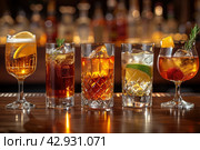 Strong alcohol drinks, hard liquors, spirits and distillates set in glasses and bottles: cognac, scotch, whiskey and other. Black bar counter background. Стоковое AI-изображение, AI-художник Ирина Михайличенко / Фотобанк Лори