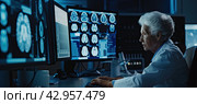 The radiologist examines the images obtained on the equipment to make a diagnosis. Стоковое AI-изображение, AI-художник Ярославский Максим / Фотобанк Лори