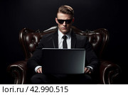 Studious Man glasses laptop. Generate Ai. Стоковое AI-изображение, AI-художник Иван Рябоконь / Фотобанк Лори