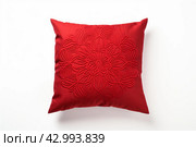 Vibrant Red bright pillow isolated on white background. Generate Ai. Стоковое AI-изображение, AI-художник Иван Рябоконь / Фотобанк Лори