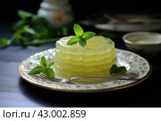 Wobbly Plate of lemon jelly mint. Generate Ai. Стоковое AI-изображение, AI-художник Иван Рябоконь / Фотобанк Лори