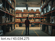Insignificant Back view of person in huge warehouse. Generate ai. Стоковое AI-изображение, AI-художник Иван Рябоконь / Фотобанк Лори