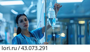 A nurse connects an IV drip to a patient in the hospital. Place for the inscription. Стоковое AI-изображение, AI-художник Ярославский Максим / Фотобанк Лори