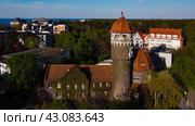 Svetlogorsk, Russia - May 1, 2024: Water tower Rauschen top ariel view. Редакционное фото, фотограф Наталья Симакова / Фотобанк Лори