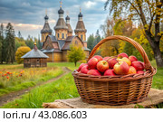 The concept of the Russian Orthodox holiday yablochny spas. A beautiful wicker basket made of vines with red ripe apples on the background of an Orthodox church. Стоковое AI-изображение, AI-художник Photojuli / Фотобанк Лори