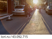 Curfew during coronavirus epidemic in Antalya, Turkey, passers-by, wearing face masks, rush to leave city street. (2021 год). Стоковое фото, фотограф Владимир Григорьев / Фотобанк Лори