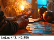 astrologer, fortune teller using tarot cards, mysticism, astrology, predictions. Стоковое AI-изображение, AI-художник Ольга Ильина / Фотобанк Лори