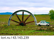 Russia Bashkortostan May 20, 2010: old cogwheel in the village of Tirlyansky, a landmark of the Southern Urals. Редакционное фото, фотограф Акиньшин Владимир / Фотобанк Лори