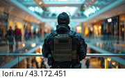 Police Officer Standing in Shopping Mall. Стоковое AI-изображение, AI-художник Юлия Гапеенко / Фотобанк Лори