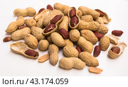 Bunch of ecological peanuts on a white background. Стоковое фото, фотограф Татьяна Яцевич / Фотобанк Лори