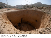 Ancient Berber troglodyte underground dwellings in Matmata, Tunisia. Стоковое фото, фотограф Яков Филимонов / Фотобанк Лори