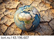 The concept of global warming of the planet earth. Dry and cracked earth, dry due to lack of rain. The effects of climate change. Стоковое AI-изображение, AI-художник Photojuli / Фотобанк Лори
