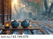 Chinese Ceremony. Brown ceramic pot and brown cup .Green tea on bamboo mat, aged wooden table. Japanese Tea - Hot Teapot And Teacups On Bamboo Mat. Стоковое AI-изображение, AI-художник Ирина Михайличенко / Фотобанк Лори