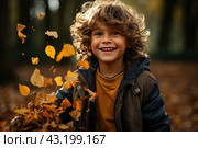 Little boy having fun during stroll in the forest at sunny autumn day. Child playing maple leaves. Baby tossing the leaves up. Active family time on nature. Hiking with little kids. Dry leaves rustle. Стоковое AI-изображение, AI-художник Ирина Михайличенко / Фотобанк Лори