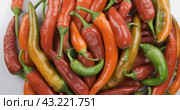 Вращение. Горсть цельного, спелого острого перца. Вид сверху. Rotation. Heap of whole, ripe hot pepper. Стоковое видео, видеограф Александр Собко / Фотобанк Лори